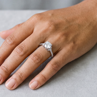1 ct Round Solitaire with Accent Stones Moissanite Ring in sterling silver, worn on hand