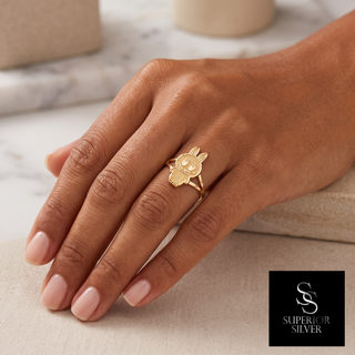 10K yellow gold character ring worn on hand