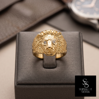 10K yellow gold lion head ring on display