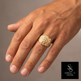 10K yellow gold lion head ring worn on hand