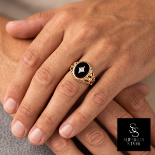 10K yellow gold men's black onyx & diamond cocktail ring worn on hand