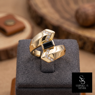 14K yellow gold men's black onyx and diamond cocktail ring on a display, Superior Silver