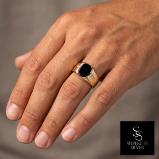 14K yellow gold men's onyx & diamond ring worn on hand