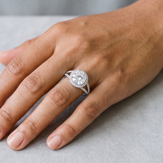 2 ct Round Halo Split Shank Moissanite Ring in sterling silver, worn on hand