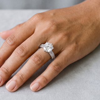 2 ct Round Solitaire on Double Pavé Band Moissanite Ring in sterling silver, worn on hand