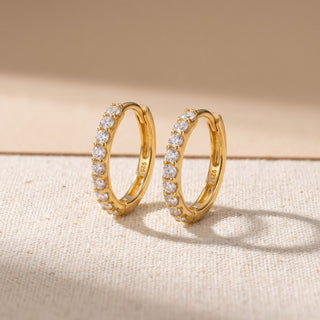 Slim shared prong moissanite huggie hoop earrings, front and side view
