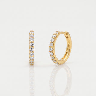 Slim shared prong moissanite huggie hoop earrings, hero