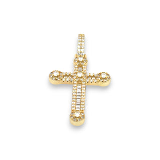 A gold cross pendant adorned with small clear stones set along the arms and bail, shown on a plain white background.