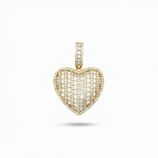 A heart-shaped pendant encrusted with small clear stones in a gold setting, suspended against a plain white background.