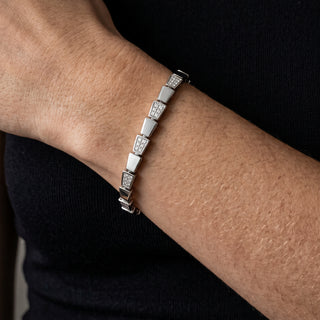 Alternating Pavé Tapered Link Moissanite Bracelet in Sterling Silver worn on the wrist