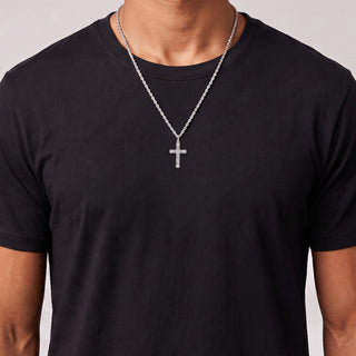 Baguette Channel Cross with Halo Tips Moissanite Pendant in sterling silver, worn on model