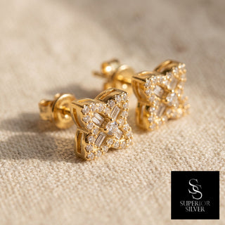 Close-up of the gold vermeil baguette flower showing the pave border and concave square outline