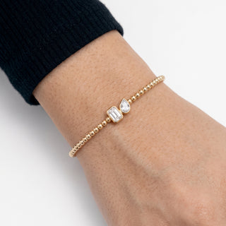 Beaded Two-Stone Station Moissanite Bangle in Sterling Silver worn on the wrist