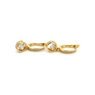 Bezel round drop pavé huggie moissanite earrings in yellow gold vermeil over sterling silver