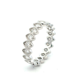 Bezel-Set heart eternity band moissanite ring in sterling silver
