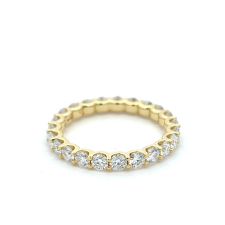 Bezel-Set round eternity band moissanite ring in yellow gold vermeil over sterling silver