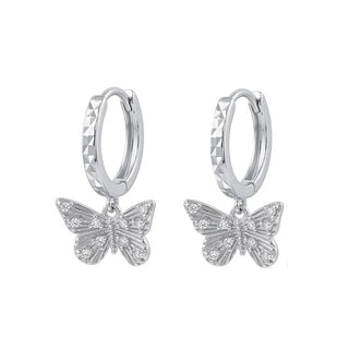 Butterfly Charm Diamond-Cut Moissanite Huggie Earrings in sterling silver