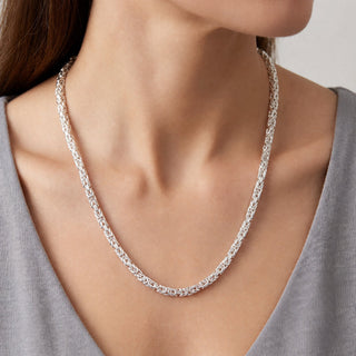 Superior Silver 20-inch Byzantine link chain crafted from polished solid 925 sterling silver worn around the neck