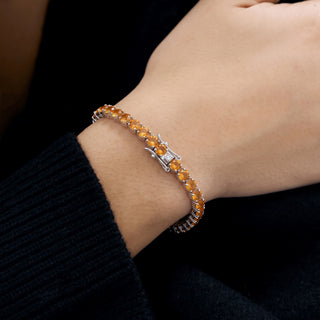 Round Cut Citrine Tennis Bracelet in Sterling Silver worn on the wrist