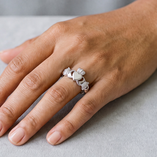 Claddagh with Stone-Set Crown and Cuffs Moissanite Ring in sterling silver, worn on hand