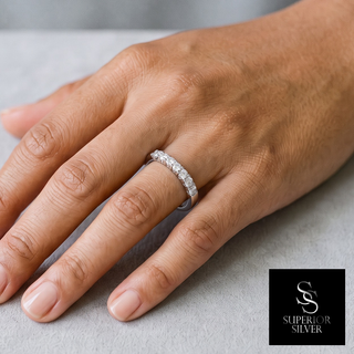 Classic Round-Stone Half Eternity Band Moissanite Ring in sterling silver, worn on hand