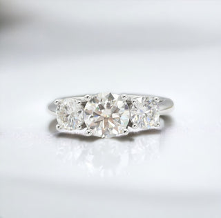 Classic round three-stone moissanite ring in sterling silver, view 2
