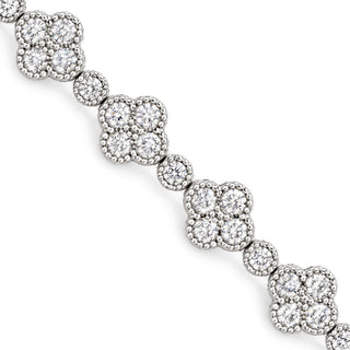 Clover and round stone moissanite tennis bracelet in sterling silver, close-up of clover stations