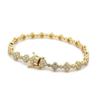 Clover and round stone moissanite tennis bracelet in yellow gold vermeil over sterling silver