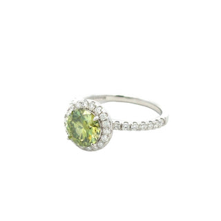 Colored center halo on pavé band moissanite ring in sterling silver with a green center stone