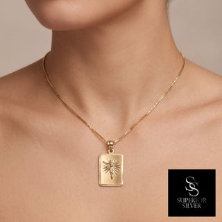 Crucifix Jesus on Cross 14K Yellow Gold Pendant worn on a model
