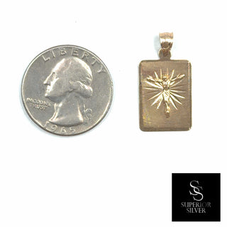 Crucifix Jesus on Cross 14K Yellow Gold Pendant size comparison next to a US quarter