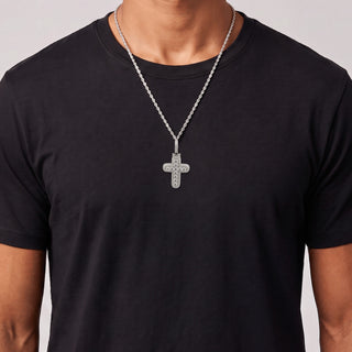 Domed Micro-Pavé Cross with Large Round Center Row Moissanite Pendant in sterling silver, worn on model