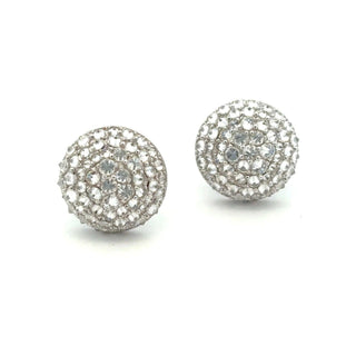 Domed round pavé moissanite stud earrings in sterling silver