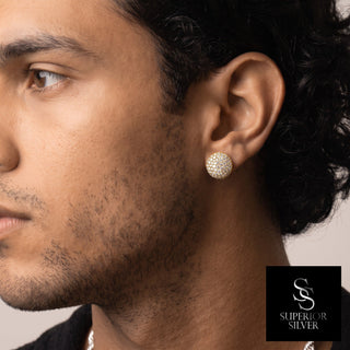 Domed round pavé moissanite stud earrings in yellow gold vermeil over sterling silver, worn on model