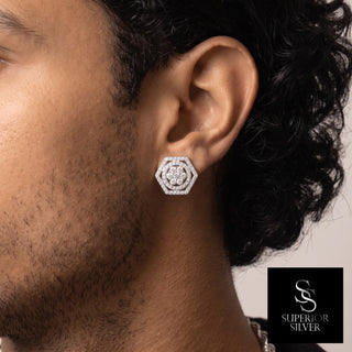 Double Hexagon Halo Pavé Moissanite Stud Earrings in sterling silver, worn on model