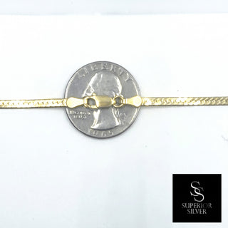 Flat Franco Chain 14kt Yellow Gold over 925 Sterling Silver 24inch 2.72mm closeup on quarter
