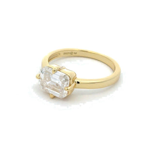 East-West emerald-cut solitaire moissanite ring in yellow gold vermeil over sterling silver
