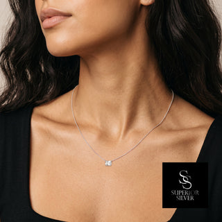 East-West Rectangle Solitaire Moissanite Necklace in sterling silver, worn on model