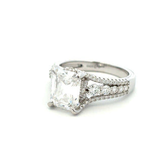 Emerald-Cut solitaire with three-row split shank moissanite ring in sterling silver