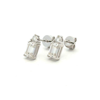 Emerald-cut two-stone moissanite stud earrings in sterling silver