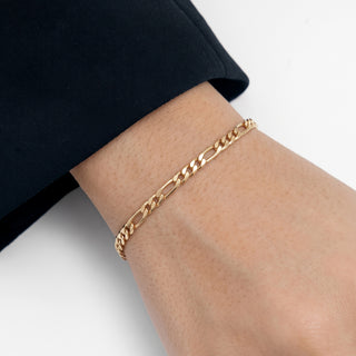 Figaro Link Bracelet 10K Yellow Gold 7.5inch/4.7mm worn on the wrist