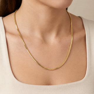 Superior Silver 22-inch flat Franco chain necklace in 14kt yellow gold over 925 sterling silver worn on a model.