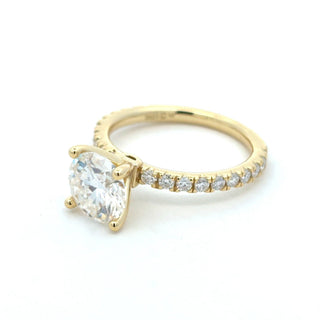 Four-Prong cushion solitaire on pavé band moissanite ring in yellow gold vermeil over sterling silver