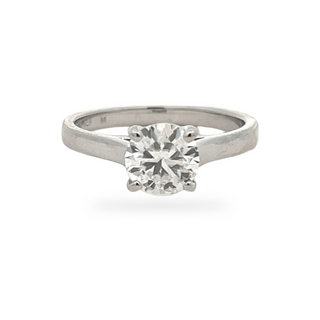 Four-Prong round cathedral solitaire moissanite ring in sterling silver