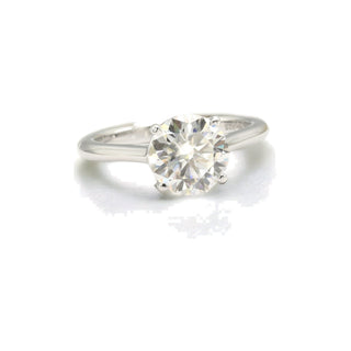 Four-Prong round solitaire on polished band moissanite ring in sterling silver