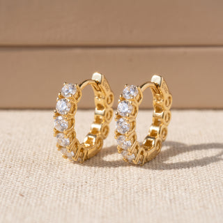 Gold vermeil 17mm eternity shared prong moissanite huggie hoop earrings, macro detail