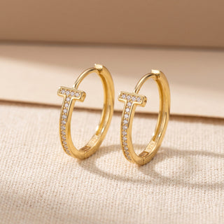 Gold vermeil 18mm slim pave T bar moissanite huggie hoop earrings, macro detail of the T bar