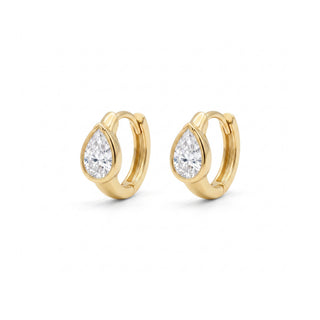 Bezel-set pear moissanite huggie hoop earrings in yellow gold vermeil over 925 sterling silver