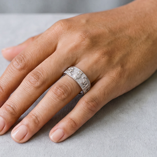 Good Luck Charms Pavé Band Moissanite Ring in sterling silver, worn on hand