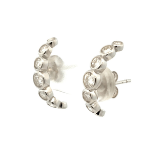 Graduated bezel moissanite half hoop earrings in sterling silver